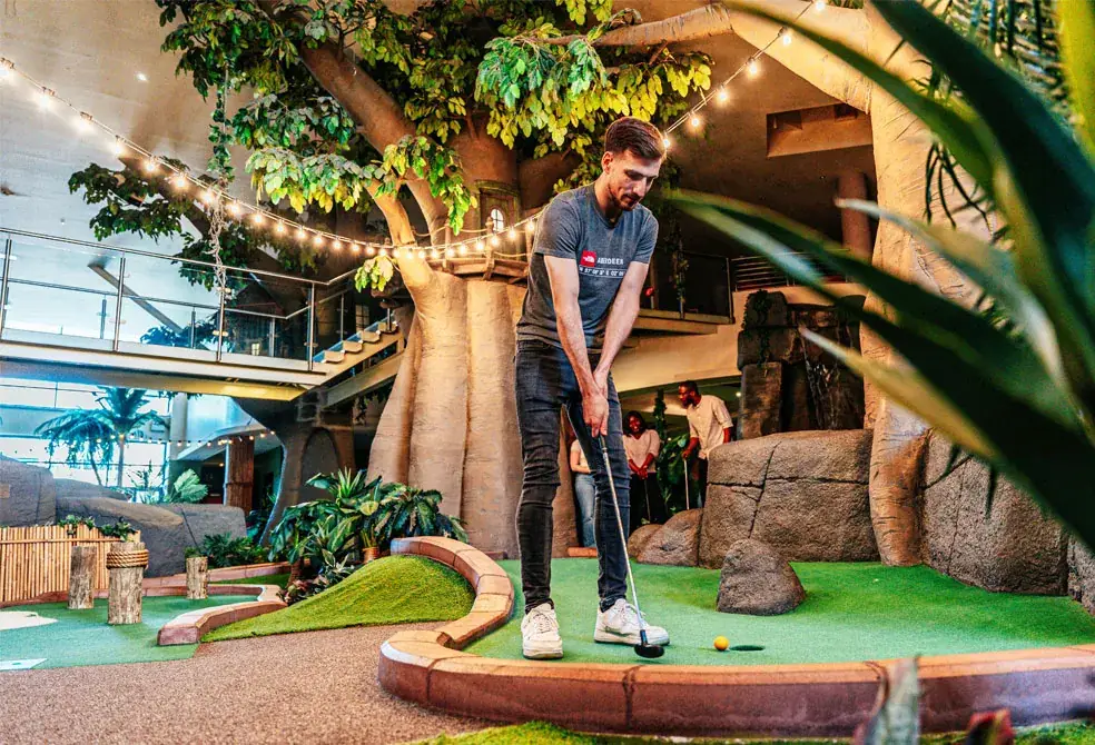 A golfer lining up a putt